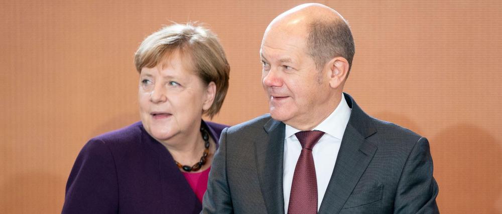 Sollen die große Koalition zusammenhalten: Kanzlerin Angela Merkel (CDU) und Finanzminister Olaf Scholz (SPD).