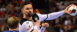 Ganz oben: Kein Sportevent im TV schauten mehr Menschen als das Halbfinale der Handball-WM zwischen Deutschland (hier Fabian Wiede, rechts) und Norwegen.