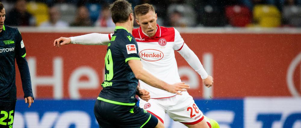 Torschützen unter sich. Rouwen Hennings trifft zum 1:0, Michael Parensen später zum 1:1.