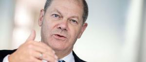 Olaf Scholz garniert seinen Gesetzesvorschlag für eine Finanztransaktionssteuer mit großen Versprechungen. 