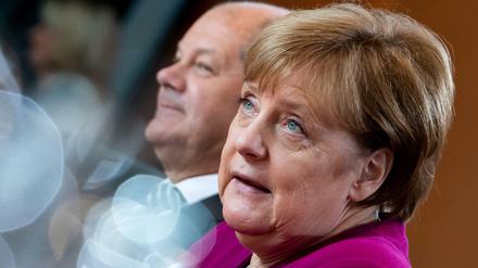 Bundeskanzlerin Angela Merkel (CDU) und Bundesfinanzminister Olaf Scholz (SPD). Ursprünglich hatte sich die Koalition auf neue Informationsrechte geeinigt. 