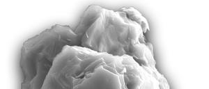 Im Elektronenmikroskop sieht das etwa acht Mikrometer große Körnchen Sternenstaub aus Siliziumcarbid unscheinbar aus – und zeugt doch von Zeiten lange vor Entstehung der Sonne. 