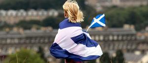 Blau-weißer Stolz: Ein Kind, in eine schottische Flagge gehüllt, bei einer Demonstration für die schottische Unabhängigkeit.