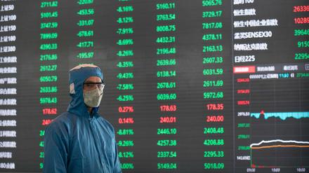 In China meint Rot ein Plus und Grün ein Minus. Eine Anzeigentafel an der Börse in Schanghai.