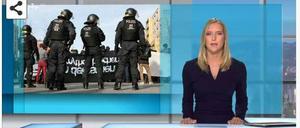 Die MDR-Moderation mit dem bearbeiteten Bild zur Demo in Dresden.
