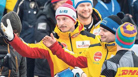 Eric Franke (li.) hat im Viererbob mit Pilot Nico Walther Platz drei belegt. 