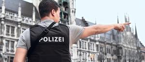 Hier ist es sicher: Ein Polizist auf dem Marienplatz in München. 