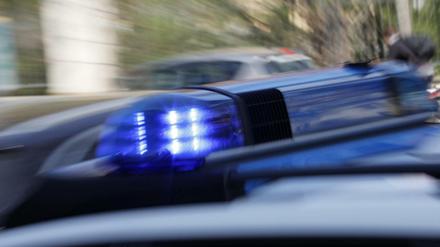 Polizei mit Blaulicht (Symbolbild).