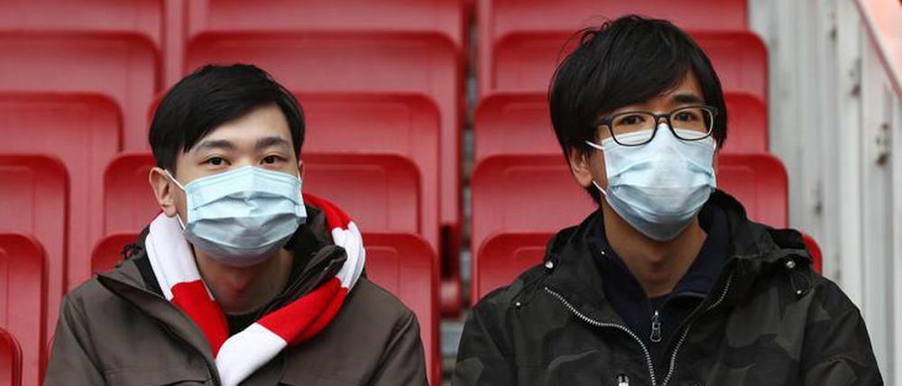 Leere Ränge und Schutzmasken: Der Sport steht vor schwierigen Wochen.