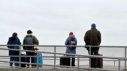 Norddeutsche Tristesse. Urlauber auf Heimweg.