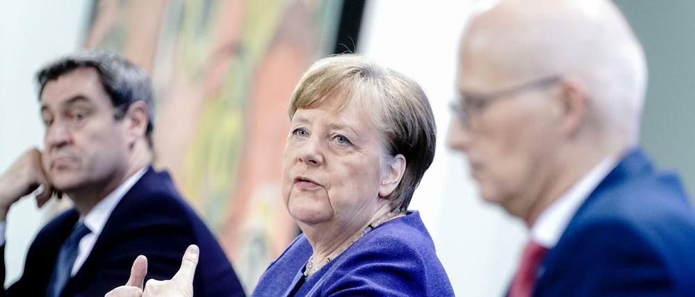 Markus Söder, Angela Merkel, Peter Tschentscher.