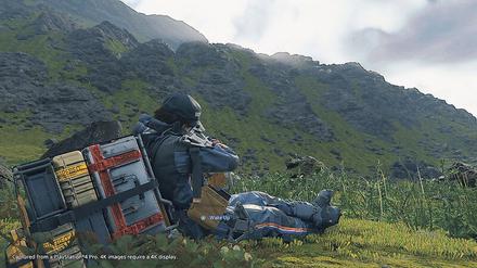 Dystopische Gegend. In „Death Stranding“ werden Frachten zu Fuß geschleppt.