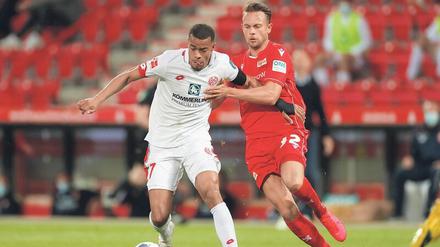 Mit und ohne Ball. Marcus Ingvartsen (r.) bekam im Spiel gegen Mainz einiges zu hören. Passenderweise hatte er auch eine gute Antwort parat.