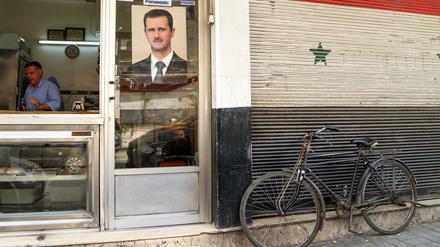 Ein Foto von Syriens Präsident Assad.