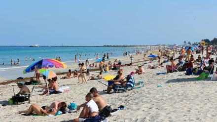 Am Strand von Miami tummeln sich die Badegäste. Rund um den 4. Juli ist der Strand geschlossen.
