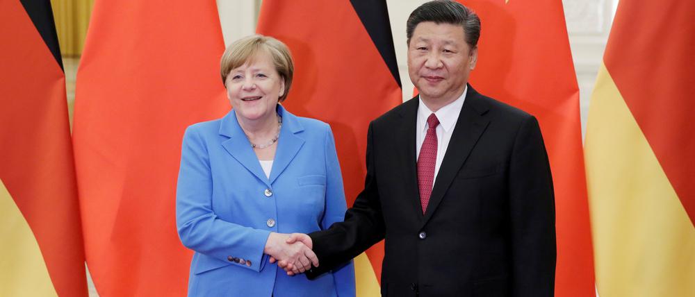 Von Sozialdemokraten neuerdings misstrauisch beäugt: Angela Merkel und Chinas Präsident Xi Jinping -hier 2018 in Peking.