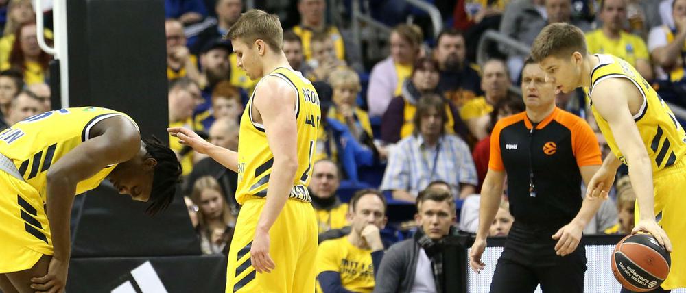 Nicht mehr in Gelb: Landry Nnoko, Makai Mason und Rokas Giedraitis (von links nach recht) verlassen Alba Berlin.