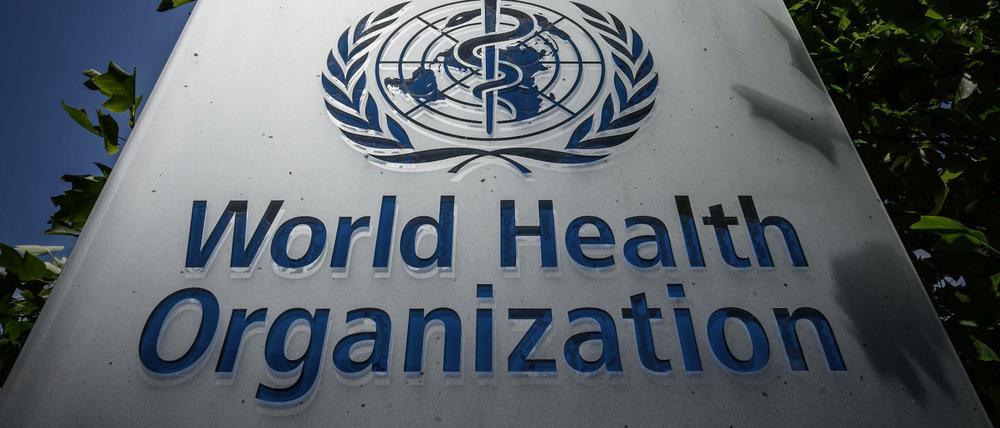 Ein Schild am Hauptsitz der Weltgesundheitsorganisation in Genf
