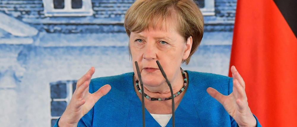 Nicht verzwergen. Bundeskanzlerin Angela Merkel dringt auf EU-Einigung beim Hilfspaket.