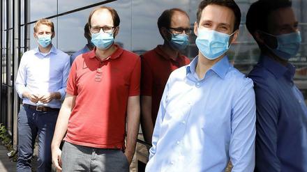 Florian Klein, Matthias Zehner und Christoph Kreer (von links) von der Uniklinik Köln haben Teile der Entwicklung von Antikörpern gegen Sars-CoV-2 entschlüsselt und hochpotente neutralisierende Antikörper gegen das Virus gefunden.