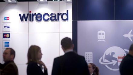 Besucher an einem Stand von Wirecard zum Thema Bezahlsysteme auf der Internationalen Tourismusbörse ITB in Berlin.