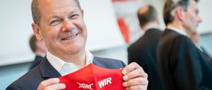 Seht her, ich kann auch Gemeinsinn: Vizekanzler Olaf Scholz mit Maske und Botschaft