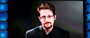 Edward Snowden auf der Leinwand bei einer Konferenz in Lissabon 2019 