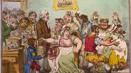 „Die wundervollen Effekte der neuen Impfung“ heißt dieses 219 Jahre alte Bild von James Gillray. Es zeigt Jenner bei der Arbeit – und dessen „Opfer“.