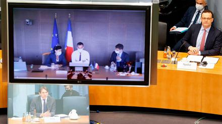 Digitales Meeting. Gesundheitsminister Spahn (rechts) und sein französischer Kollege Véran (links im Monitor) am Dienstag.
