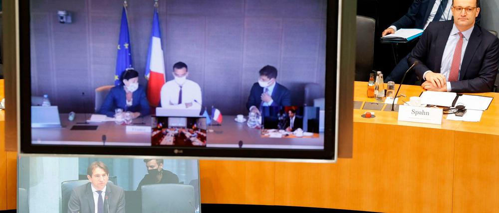 Digitales Meeting. Gesundheitsminister Spahn (rechts) und sein französischer Kollege Véran (links im Monitor) am Dienstag.