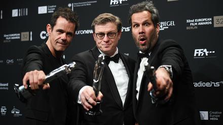Preisträger des letzten Jahrgangs. Die Regisseure Tom Tykwer, Hendrik Handloegten und Achim von Borries.