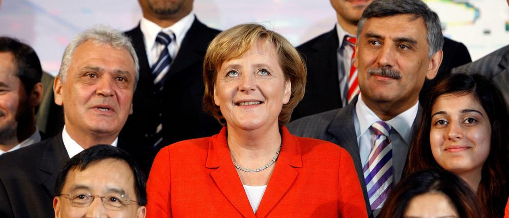 Premiere: Familienfoto vom ersten Integrationsgipfel mit der Kanzlerin 2006