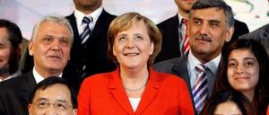 Premiere: Familienfoto vom ersten Integrationsgipfel mit der Kanzlerin 2006
