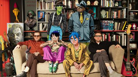 Die Gorillaz mit ihren Schöpfern Jamie Hewlett (links) und Damon Albarn (rechts)