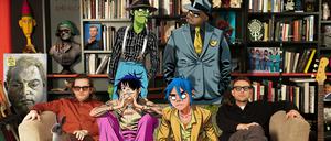 Die Gorillaz mit ihren Schöpfern Jamie Hewlett (links) und Damon Albarn (rechts)