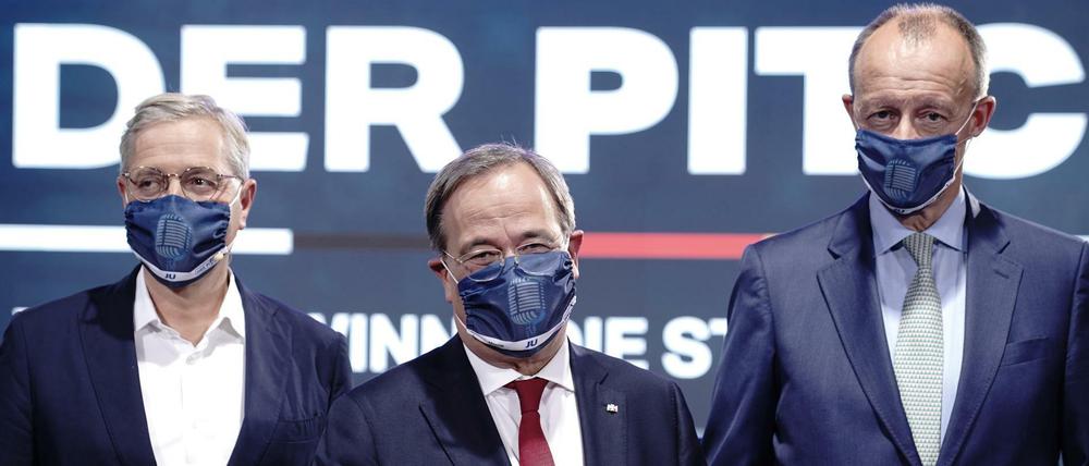 Die drei Kandidaten Norbert Röttgen, Friedrich Merz und Armin Laschet stellen sich der Debatte. 
