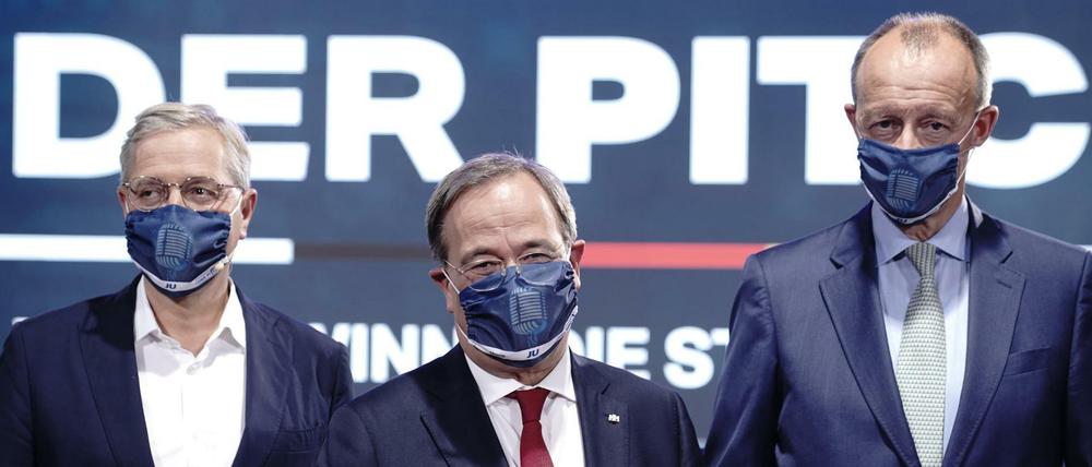 Die Drei von der Nahtstelle. Norbert Röttgen (l.), Armin Laschet (M.)und Friedrich Merz bei einem Online-Talk der Jungen Union.