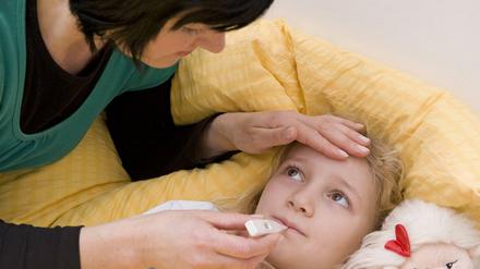 Oft schwierig für Arbeitnehmer: Kranke Kinder müssen betreut werden.