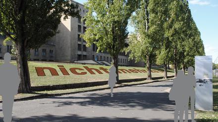 Ein roter Schriftzug soll Passanten an das KZ Columbia erinnern, das einst hier stand.