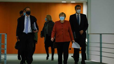 Michael Müller, Angela Merkel und Markus Söder nach der Bund-Länder-Schalte.