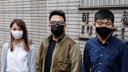 Vor Gericht: Die Hongkonger Demokratieaktivisten Agnes Chow, Ivan Lam und Joshua Wong (von links) 