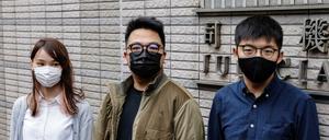 Vor Gericht: Die Hongkonger Demokratieaktivisten Agnes Chow, Ivan Lam und Joshua Wong (von links) 