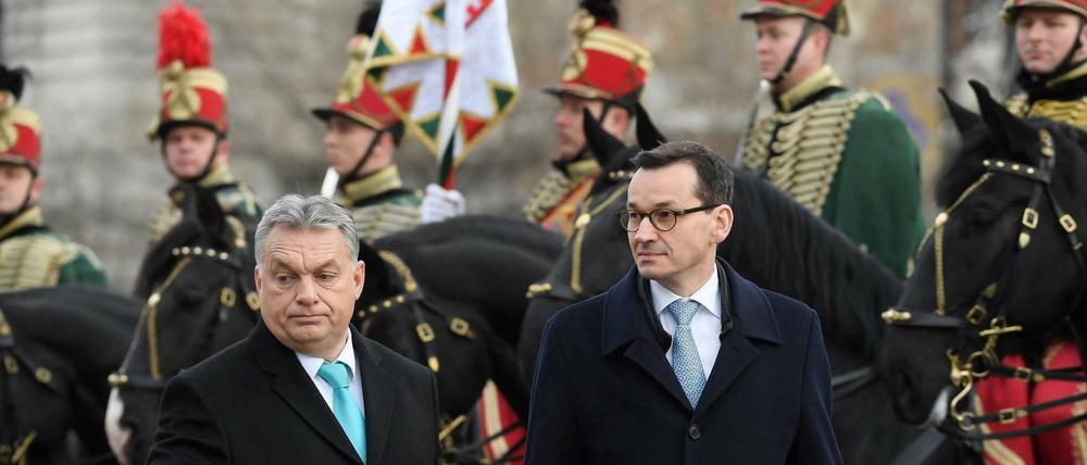 Unzertrennlich und streitbar: Die Regierungschefs Ungarns und Polens, Viktor Orban (l) und Mateusz Morawiecki. 