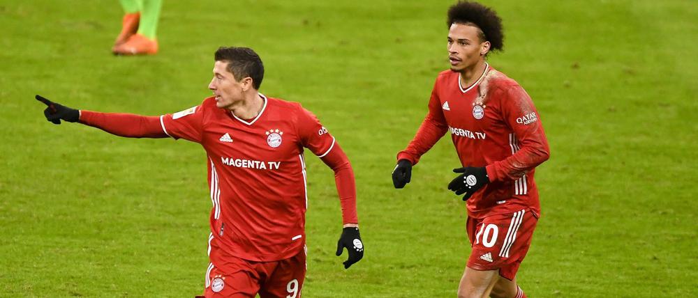 So wird das gemacht. Robret Lewandowski (links) drehte das Spiel der Bayern gegen Wolfsburg mit zwei Toren.