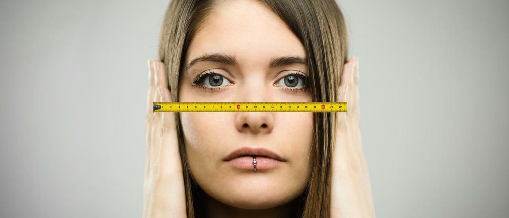 Von Ohr zu Ohr: Durchschnittlich 21,5 Centimeter beträgt der Abstand zwischen linkem und rechtem Läppchen. Sie wurden zum Maß für unsere Sicherheit.