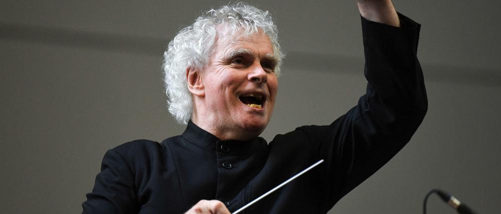 Kommt zurück nach Deutschland. Sir Simon Rattle.