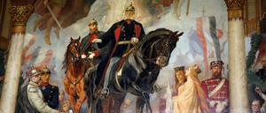 Die Reichsgründer Bismarck (links) und Wilhelm I. (zu Pferde) auf einem Gemälde in der Kaiserpfalz in Goslar. Mit einem ganzen Bilderzyklus des Historienmalers Hermann Wislicenus gerade dort versuchten die Hohenzollern ihren neuen Staat in die Tradition des alten Reichs zu stellen.