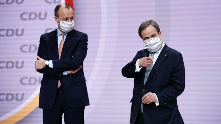 Der unterlegende Friedrich Merz und der neue Parteivorsitzende Armin Laschet. 