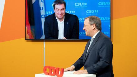 Markus Söder (l.) und Armin Laschet beim digitalen Neujahrsempfang der NRW-CDU.