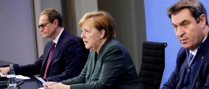 Nach dem Coronarat: Michael Müller, Angela Merkel und Markus Söder